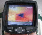 Checking moisture with our thermal image camera